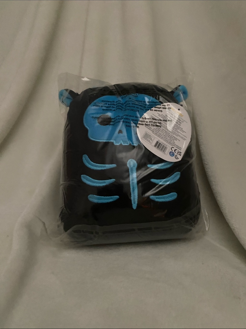 Squishmallows Black Plush with Bright Blue Skeleton Applique
